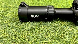 MIRA NUX HX1401-AR 3-9X40 AL Y DER PUSH PULL - RET MIL DOT - C/ANILLAS