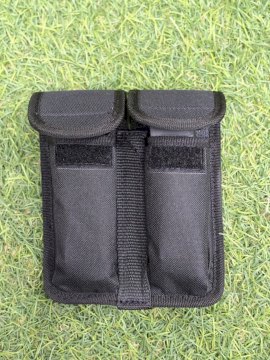 PORTA CARGADOR SURI DOBLE PARA 9MM / 45 PORTA CARGADOR SURI DOBLE PARA 9MM / 45